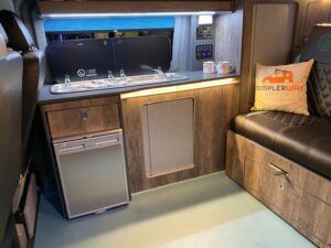 natural timber camper van conversion interior